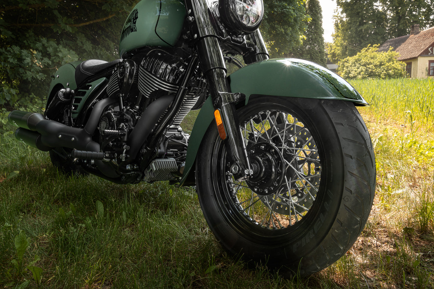 Harley Davidson motorcycle with Killer Custom "Apache" front fender from the front on the countryside
