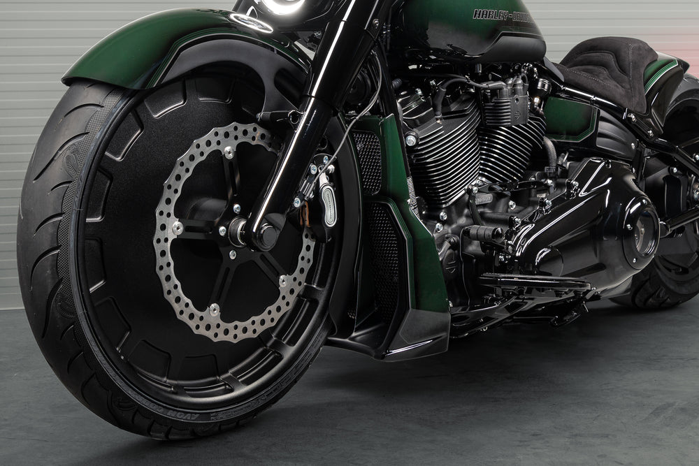 Zoomed Harley Davidson motorcycle with Killer Custom parts from the side