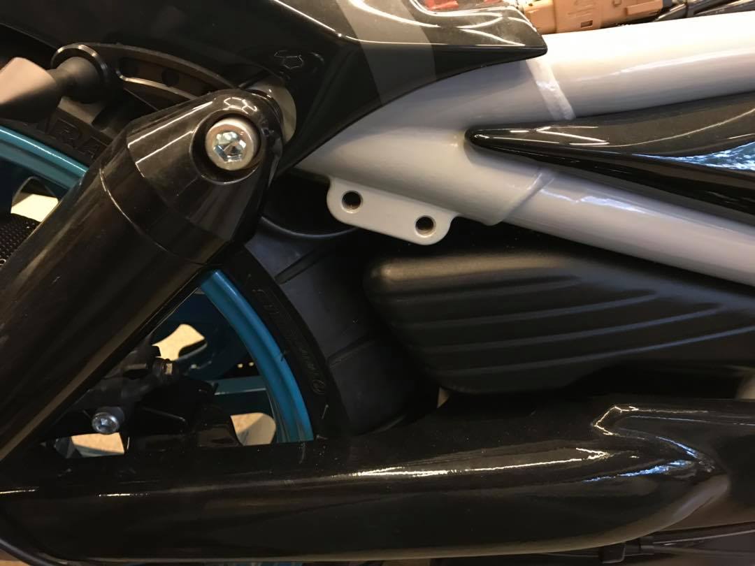 Zoomed Harley Davidson motorcycle with Killer Custom V-Rod billet reflector covers