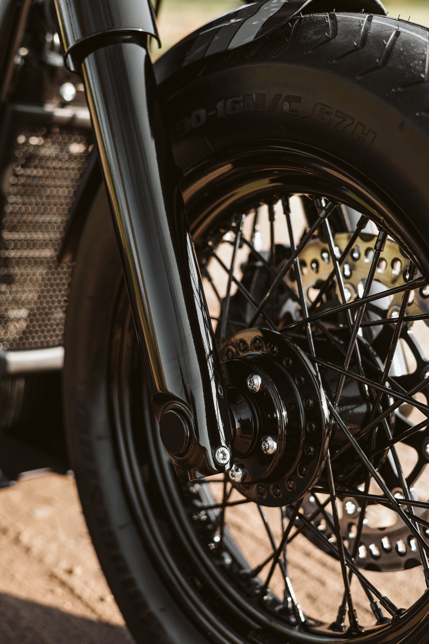Zoomed Harley Davidson motorcycle with Killer Custom front wheel spacer