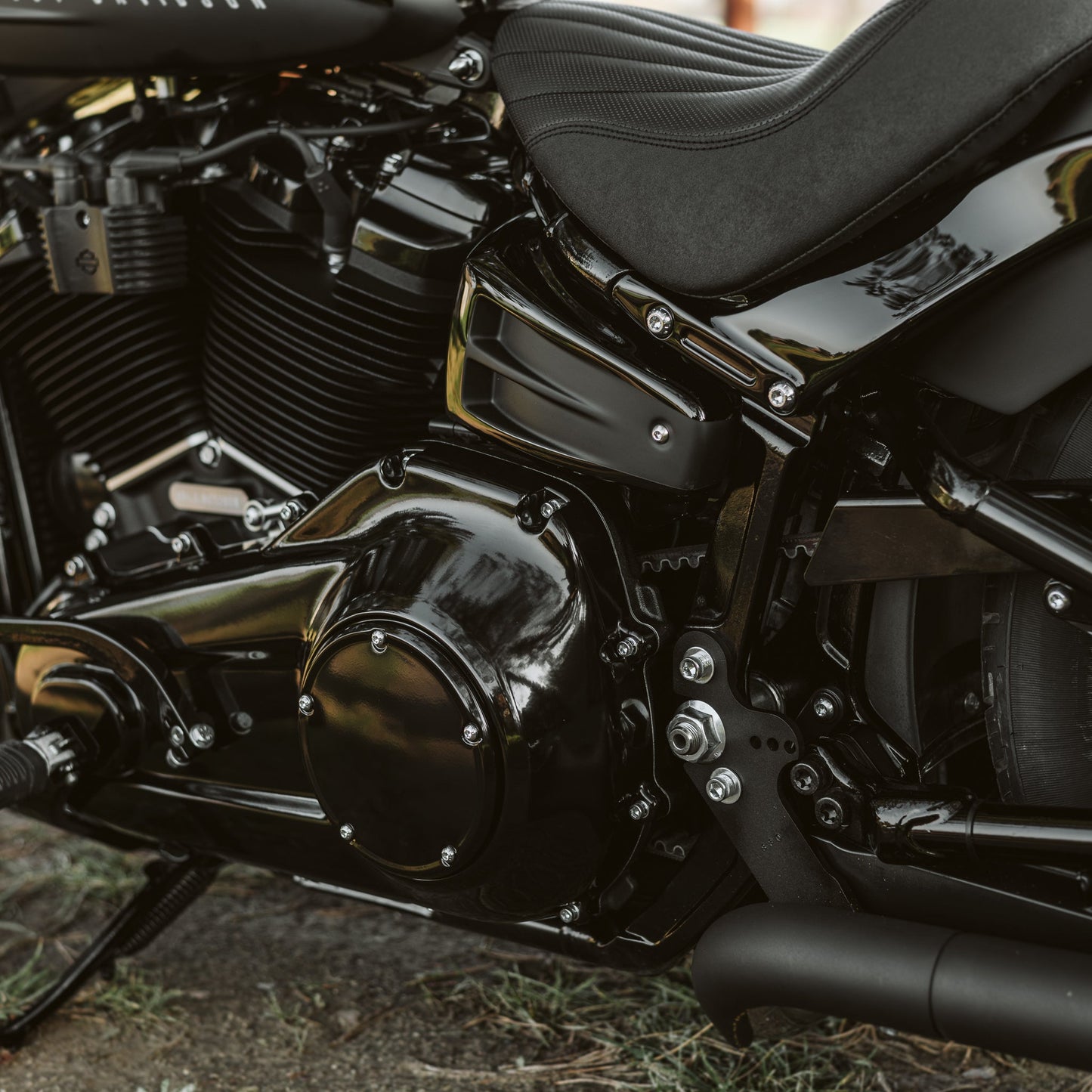 Zoomed Harley Davidson motorcycle with Killer Custom "Avenger" shock absorber adjustment knob from the side