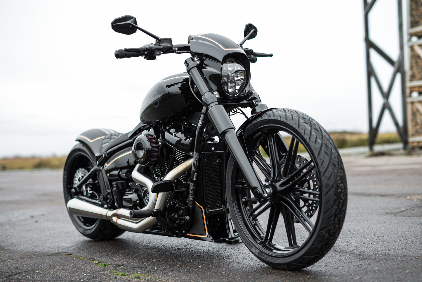 Harley Davidson motorcycle with Killer Custom "Aggressor" full fork cover set from the front blurry background