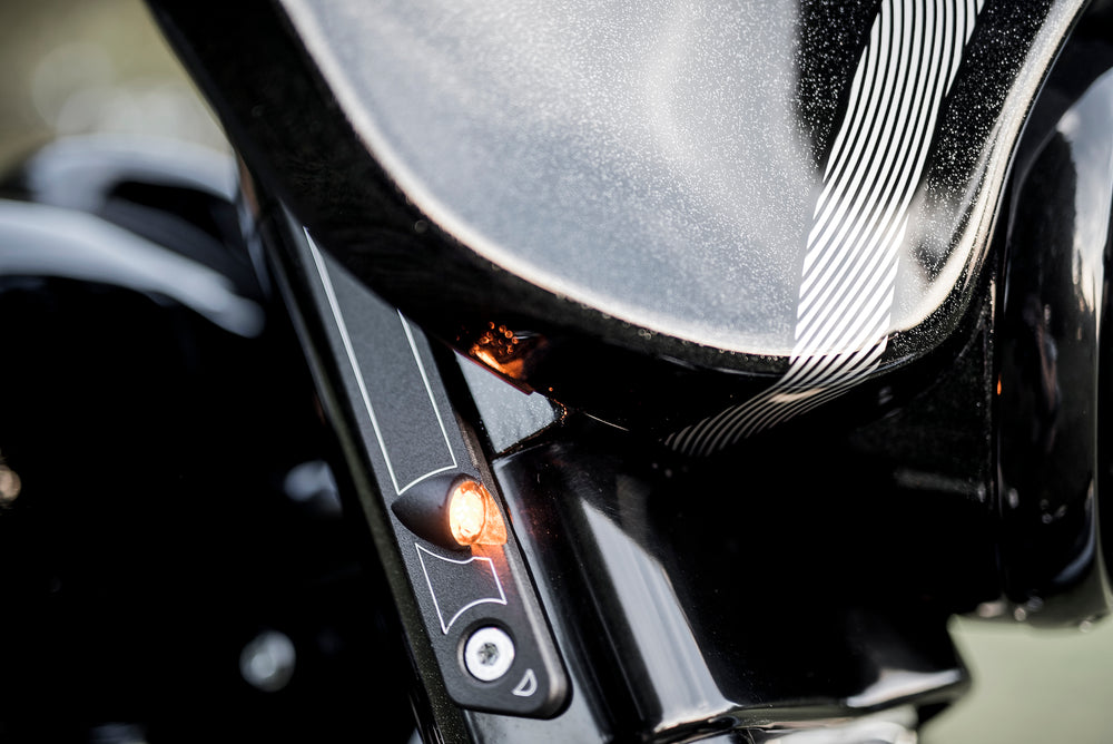 Zoomed Harley Davidson motorcycle with Killer Custom front LED turn signals