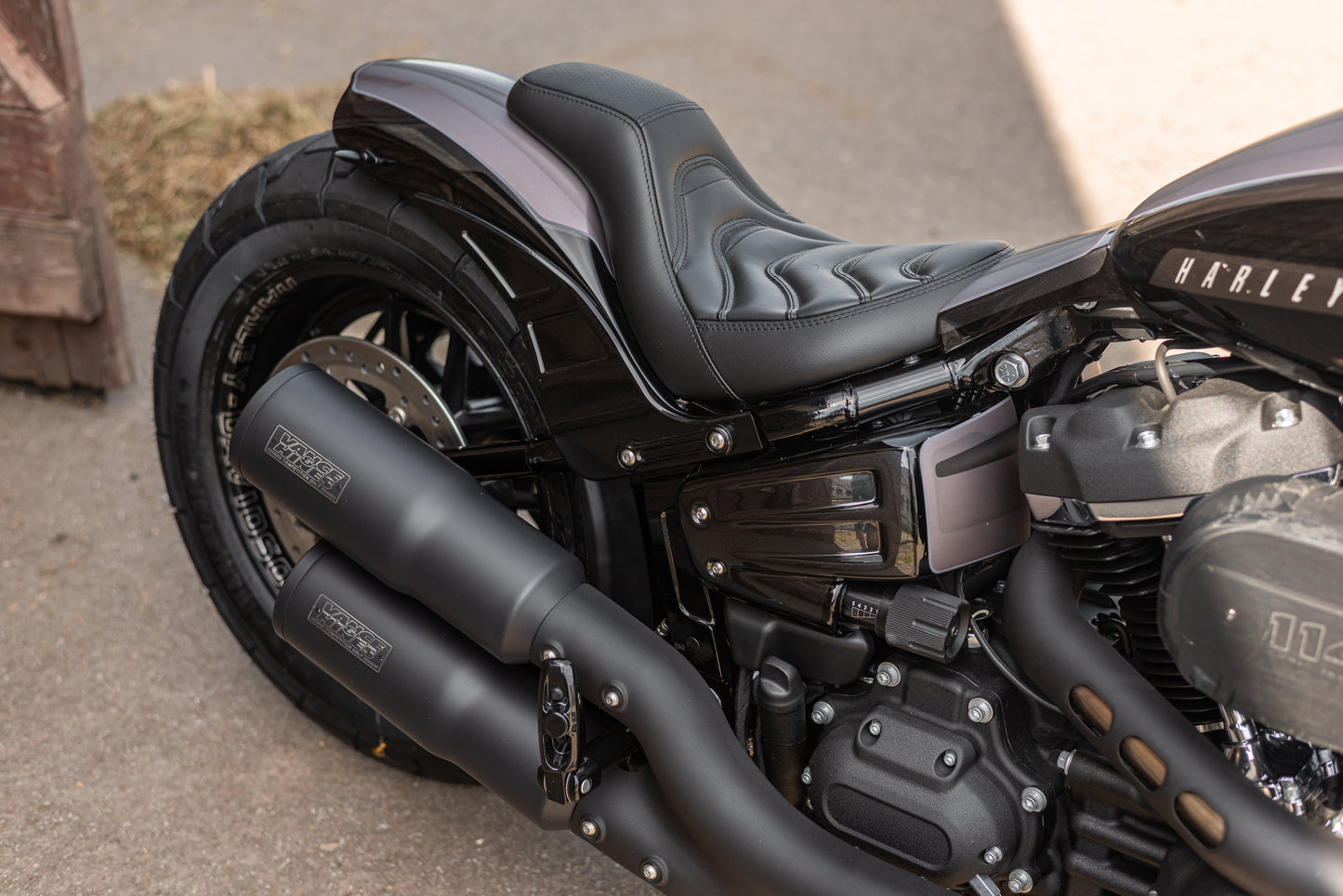 Zoomed Harley Davidson motorcycle with "Avenger" side covers from the side 