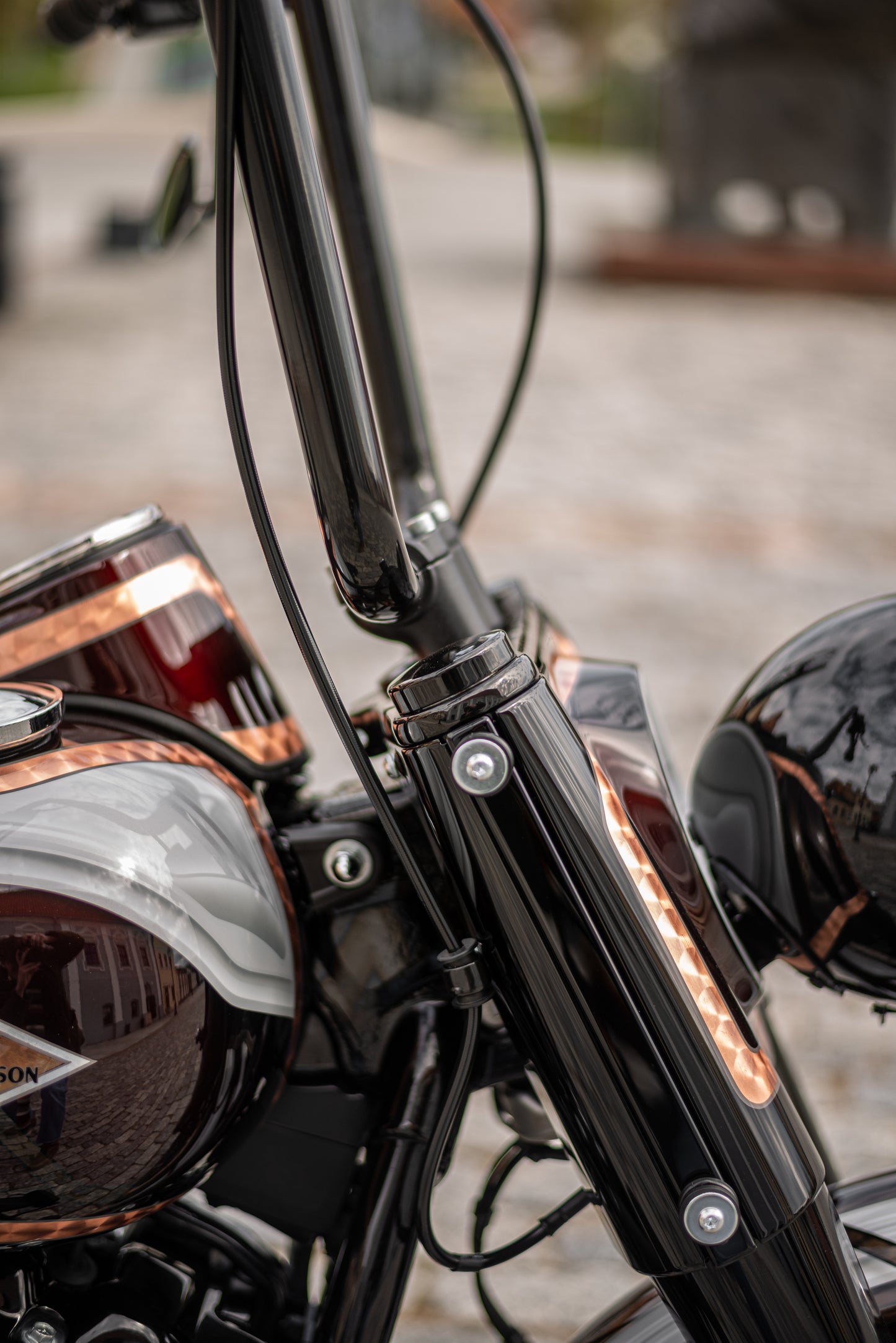 Zoomed Harley Davidson motorcycle with Killer Custom fork end caps