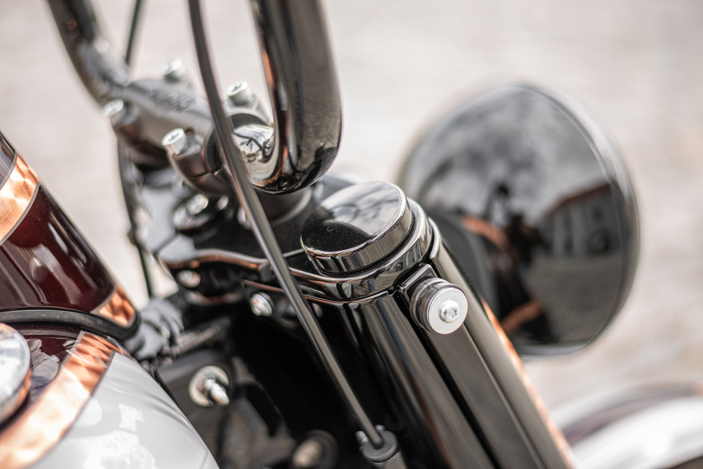 Zoomed Harley Davidson motorcycle with Killer Custom fork end caps