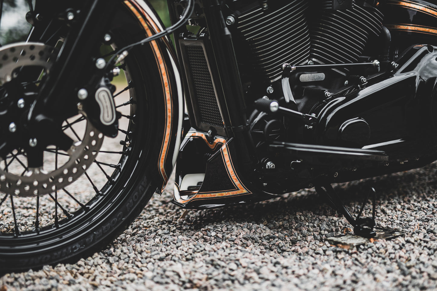 Zoomed Harley Davidson motorcycle with Killer Custom softail radiator cover from the side