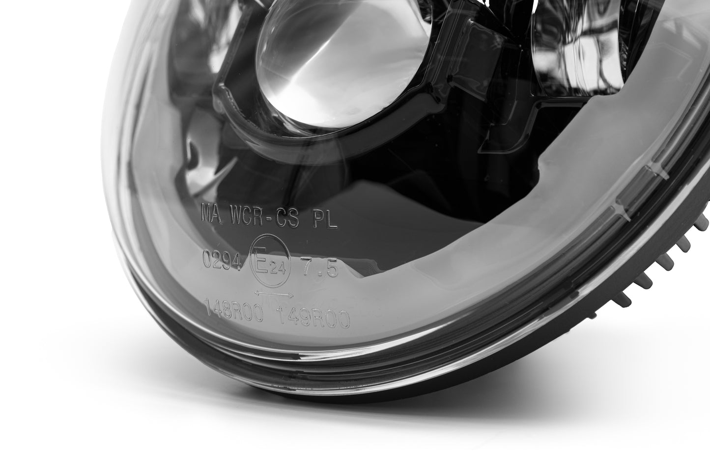 Zoomed Harley Davidson headlight with parking light by Killer Custom white background