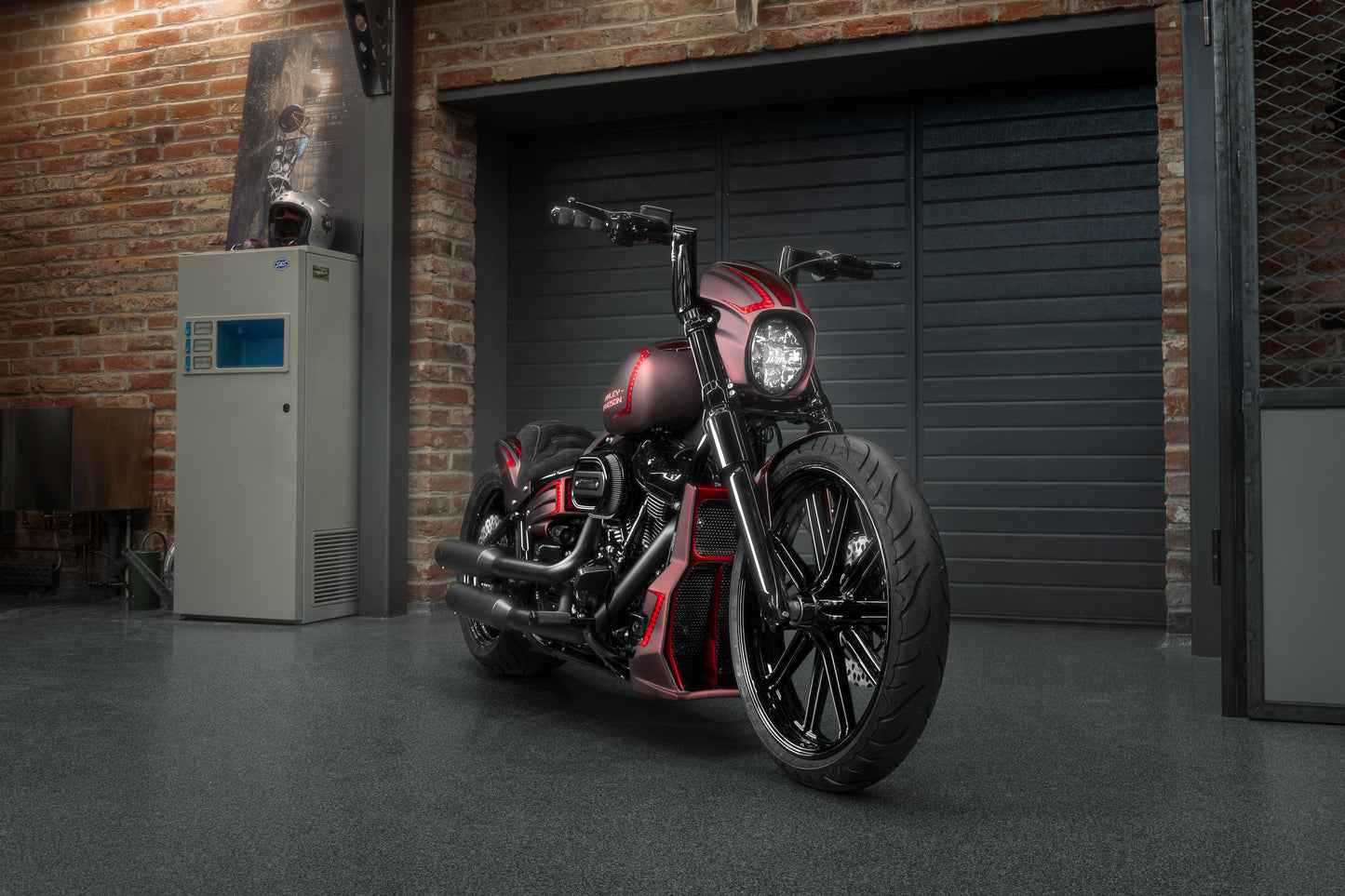 Harley Davidson motorcycle with Killer Custom "Killer Bull' fat handlebars from the front in an industrial environment